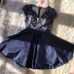 Navy blue and beige mini dress. A little poofy! From ModCloth.